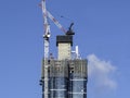 High-rise building under construction with crane Royalty Free Stock Photo