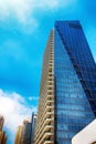 High-rise buildings against the blue sky. Bottom view