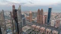 High-rise buildings on Sheikh Zayed Road in Dubai aerial night to day timelapse, UAE. Royalty Free Stock Photo