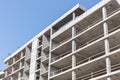 high-rise building under construction against blue clean sky background Royalty Free Stock Photo