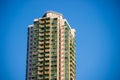 High rise condominium building against blue sky background Royalty Free Stock Photo