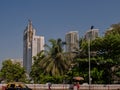 High rise developments by Mahalaxmi Station and the Western Railways train of the Mumbai Suburban Railway