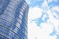 high-rise glass buildings against blue clouds, empty space for text, Royalty Free Stock Photo