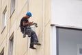 High-rise installer talking on the phone
