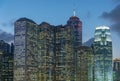 High rise modern office building and skyline of Hong Kong city at dusk Royalty Free Stock Photo