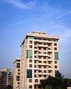 High rise, modern tall building with clear blue sky background Royalty Free Stock Photo