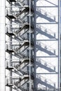 High rise office building with shadow of metal fire escape Royalty Free Stock Photo