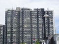 High rise residential apartment building with modern facade design.