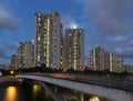 High rise residential building in Hong Kong city at dusk Royalty Free Stock Photo