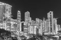 high rise residential building in Hong Kong city at night in monochrome Royalty Free Stock Photo