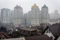 High-rise residential buildings in the fog. City in fog. Kyiv