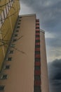 A high-rise with small red balkons with a view from below Royalty Free Stock Photo