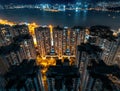 High Rise Urban Buildings with Colourful Lights at Night, Hong Kong Royalty Free Stock Photo