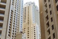 High-rise yellow building that look from below in the morning at Dubai Royalty Free Stock Photo