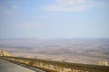 High road at bottom of Makhtesh Ramon Crater, Mitzpe Ramon, Negev desert, Israel Royalty Free Stock Photo