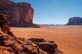 High rocky cliffs in Jordanian desert of Wadi Rum area