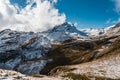 High rocky mountains covered with snow under a clear blue sky in Switzerland Royalty Free Stock Photo