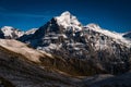 High rocky mountains covered with snow under a clear blue sky in Switzerland Royalty Free Stock Photo
