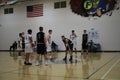 High school basketball teams on basketball court Royalty Free Stock Photo