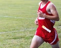 One male cross countyr runner with copy space on the right