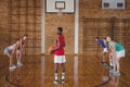 High school boy about to take a penalty shot while playing basketball in the court Royalty Free Stock Photo