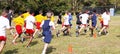 High school boys cross country runners starting a 5K race wearing face masks in 2020