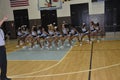 High School cheerleaders practice before a game