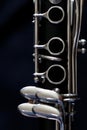 Clarinet keys on black background Royalty Free Stock Photo