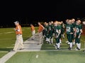 High School Football Coach Running The Team. Royalty Free Stock Photo