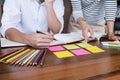 High school or college student group sitting at desk in library studying and reading, doing homework and lesson practice preparing Royalty Free Stock Photo