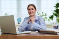 High school, college student smiling young female sitting at desk with computer Royalty Free Stock Photo