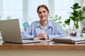 High school, college student smiling young female sitting at desk with computer Royalty Free Stock Photo