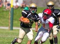 High School Football Player Running with the Ball