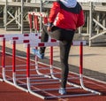 Female hurdler warming up before her race Royalty Free Stock Photo