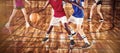 High school kids playing basketball in the court Royalty Free Stock Photo