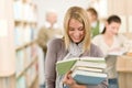 High school library - happy student with book Royalty Free Stock Photo