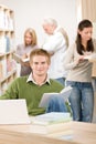 High school library - Student with book Royalty Free Stock Photo