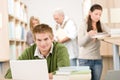 High school library - Student with book Royalty Free Stock Photo