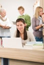 High school library - Student with laptop Royalty Free Stock Photo