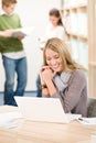 High school library - student with laptop Royalty Free Stock Photo