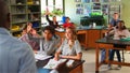 High School Pupils Raising Hands In Biology Class To Answer Question Royalty Free Stock Photo