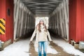 High School Senior at Covered Bridge in Winter