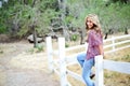 High School Senior Sitting on Fence Royalty Free Stock Photo