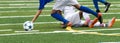 Slide tackle during soccer game