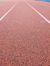 Single lane red polyurethane running track