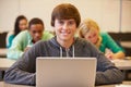 High School Student At Desk In Class Using Digital Tablet Royalty Free Stock Photo