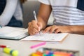 High school student filling out test answers with pen Royalty Free Stock Photo