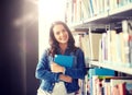 High school student girl reading book at library Royalty Free Stock Photo