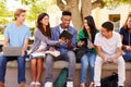 High School Students Collaborating On Project On Campus Royalty Free Stock Photo