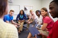 High School Students Taking Part In Group Discussi